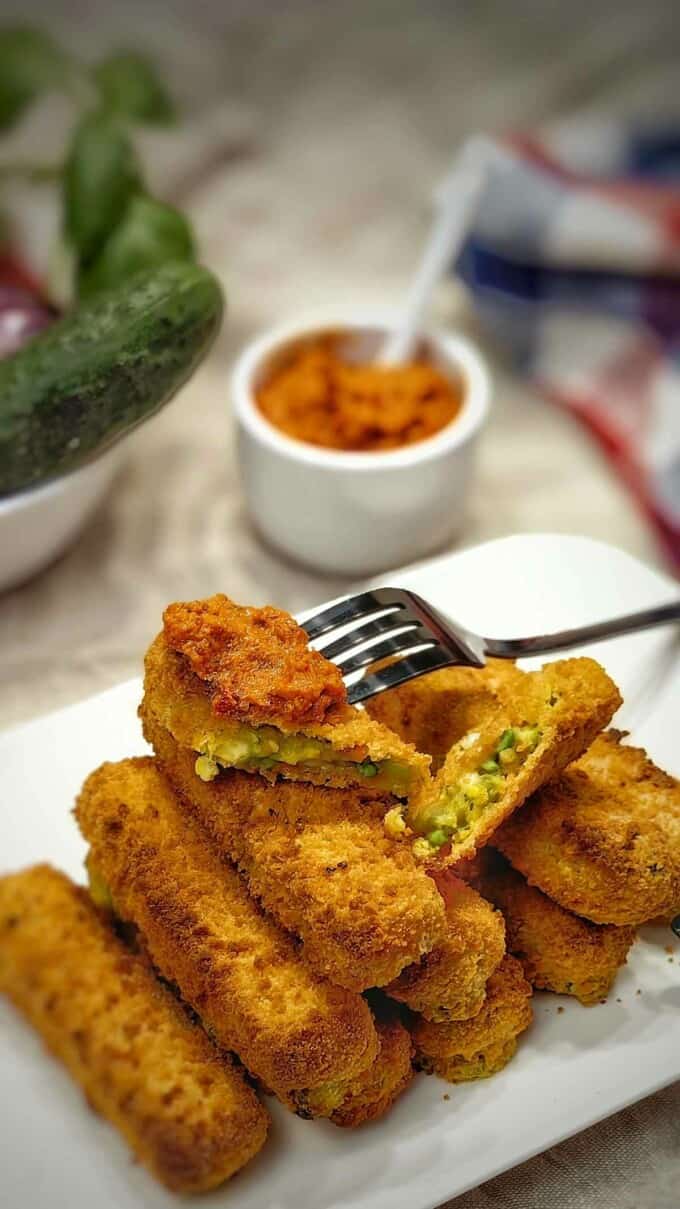 cross section of air fryer vegetable fingers on a serving plate