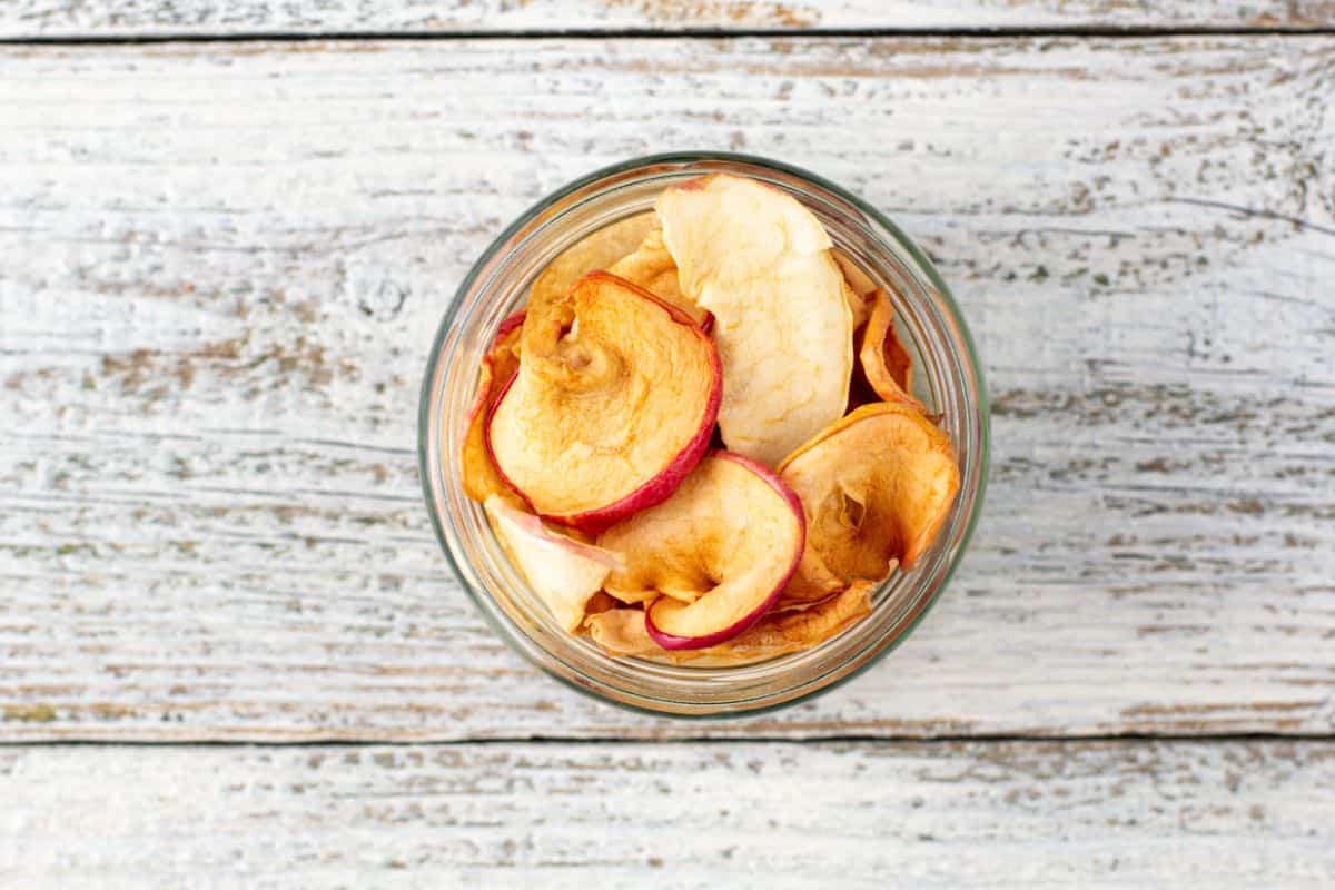 dehydrated apples in glass container
