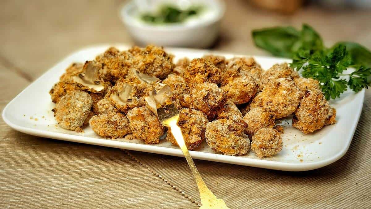 air fried breaded mushrooms with fork