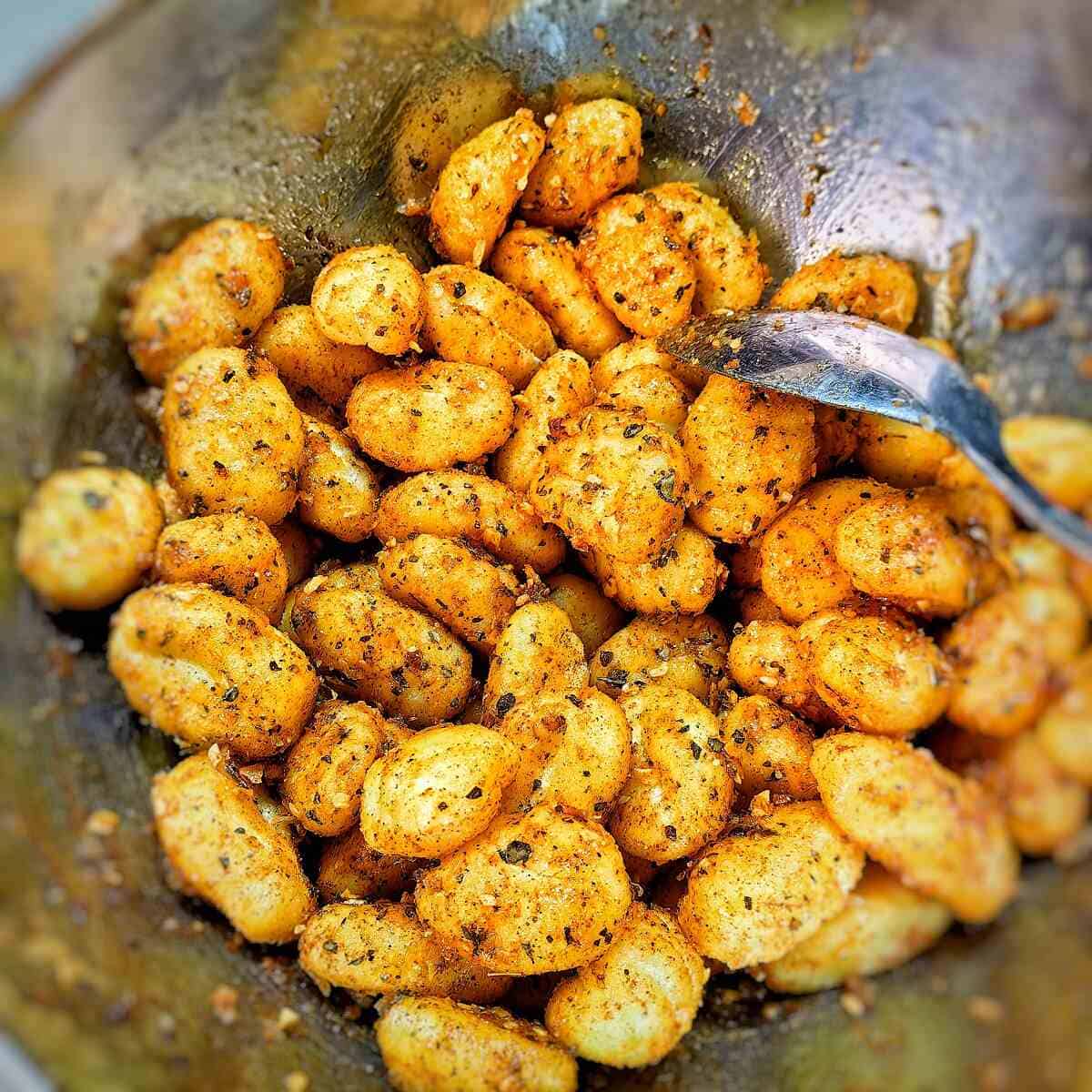 gnocchi coated with mix of spices and herbs