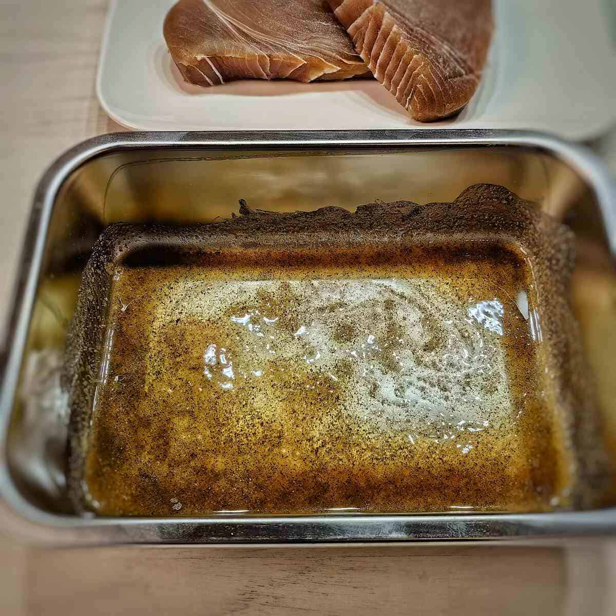 marinade in a metal container