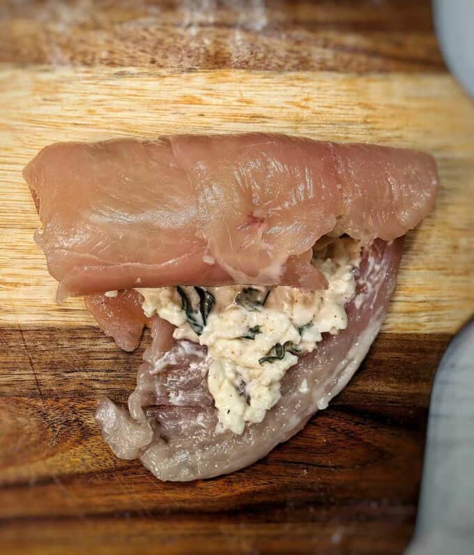 half rolled chicken breast with cheese mixture