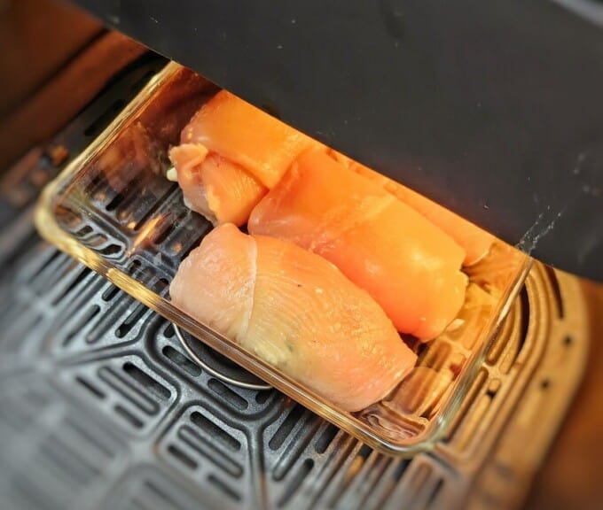 chicken breast roll-ups inside air fryer basket