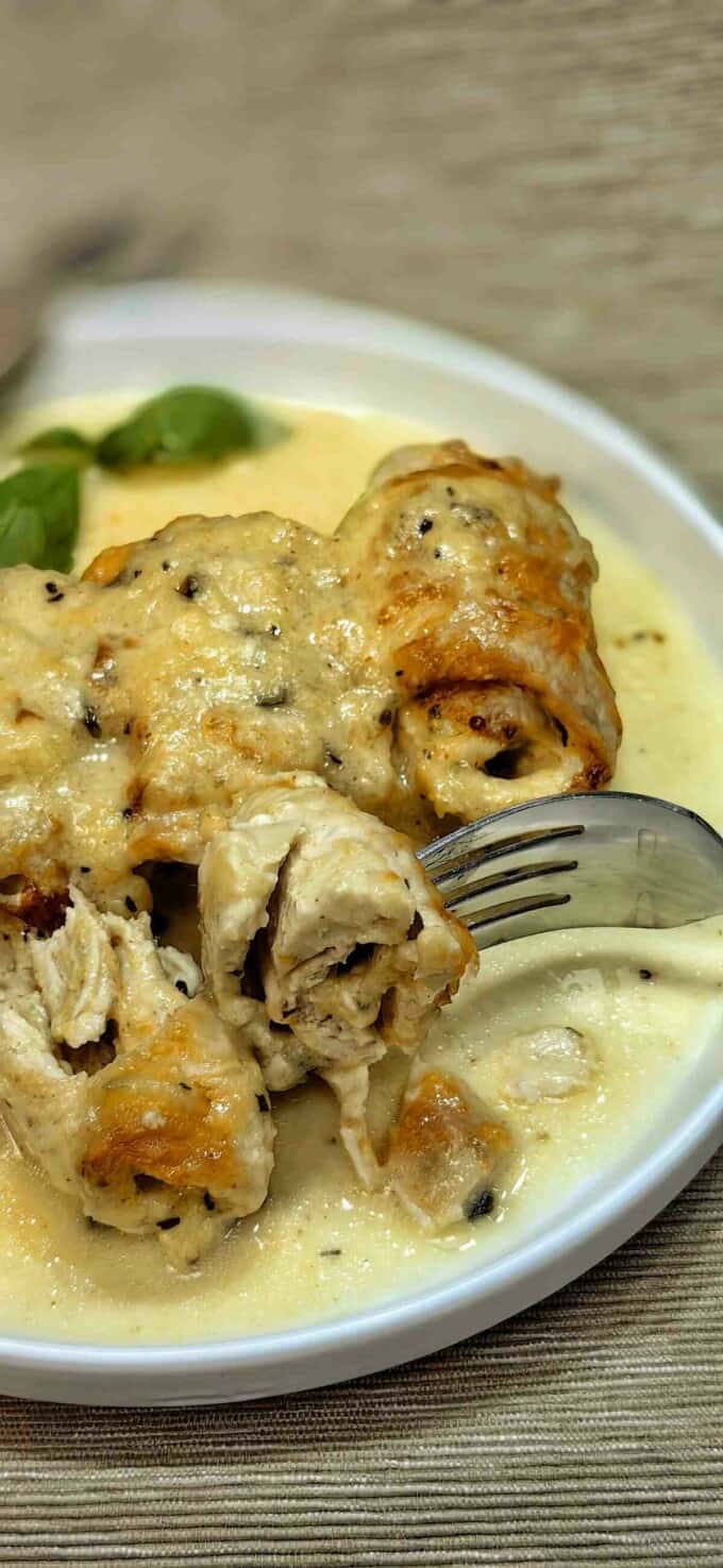 stuffed chicken breast roll-ups with fork