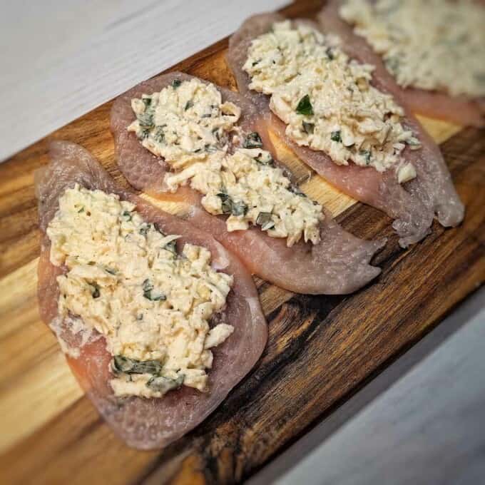 chicken breast slices with herb and cheese mixture