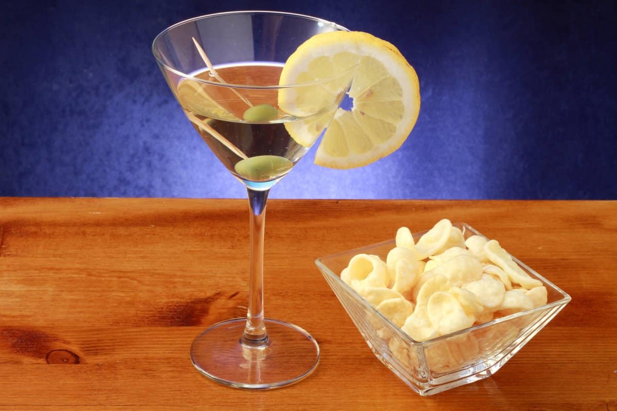 an olive sweet vermouth cocktail