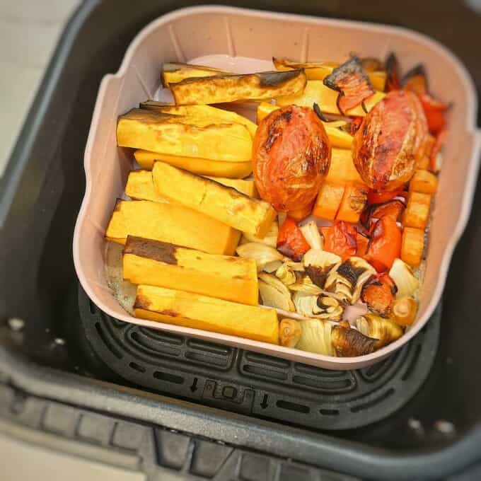 roasted vegetables 
in a silicone mold inside air fryer basket