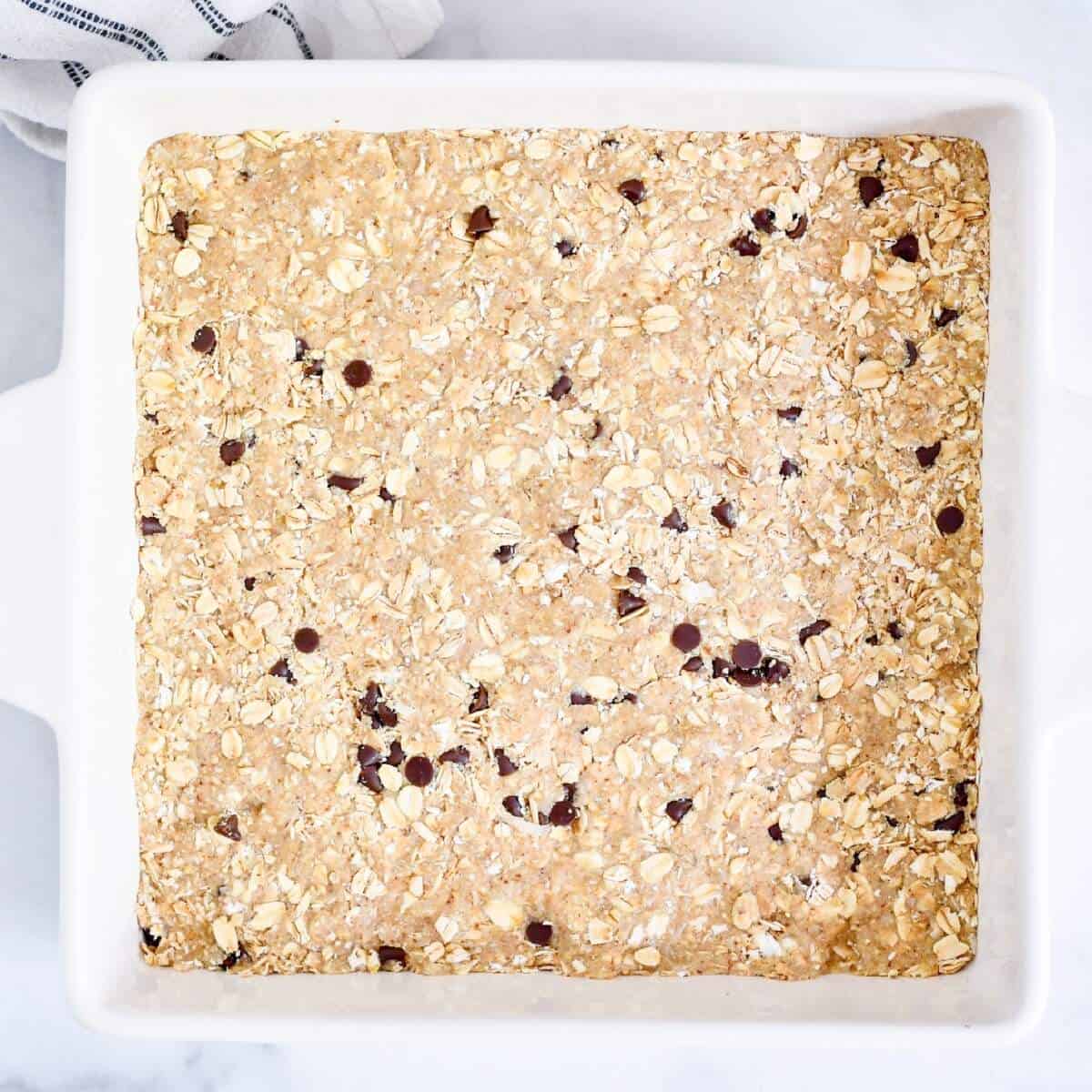 press the dough mixture into baking dish