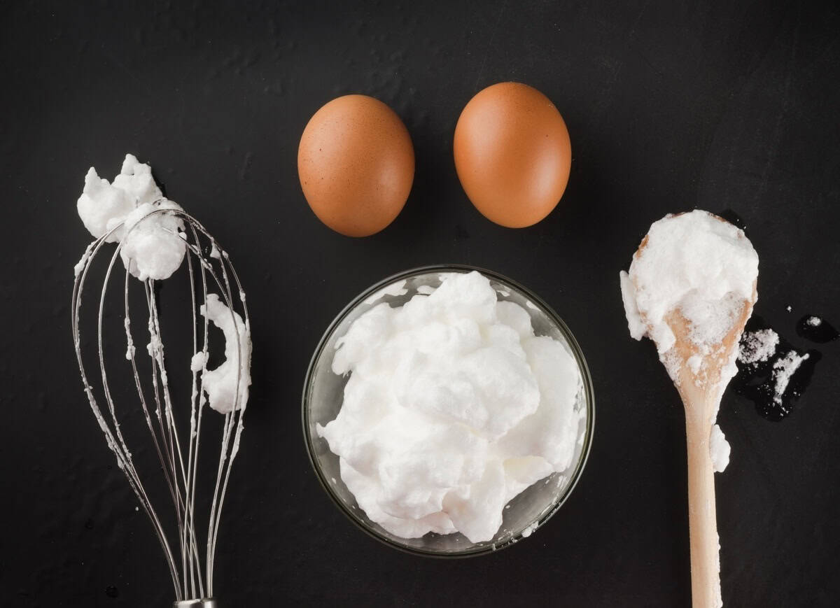 whipped egg whites for cream in a glass bowl