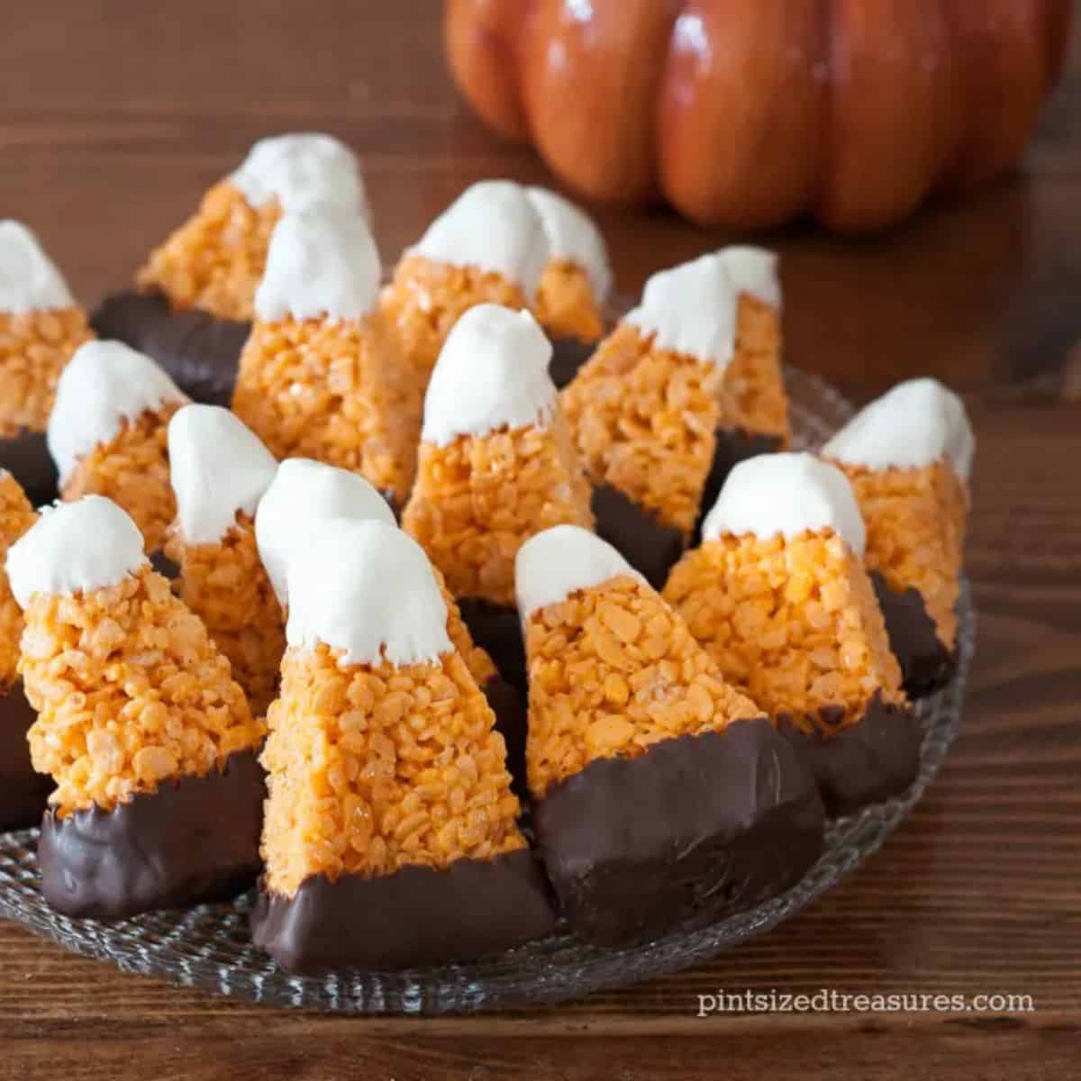 The perfect fall snack featuring candy corn rice krispies treat. 
