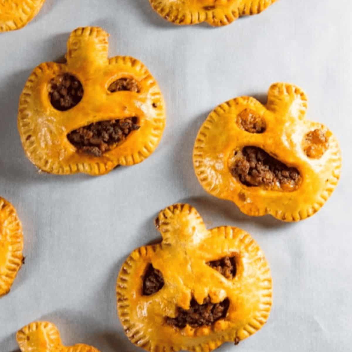 Multiple chorizo hand pies, perfect for fall and Halloween.