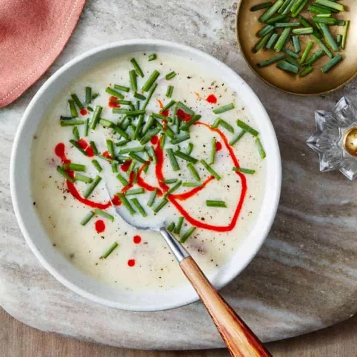 Potato-and-Ham Hock soup packed with chunky potato pieces and tender, smoky ham hock