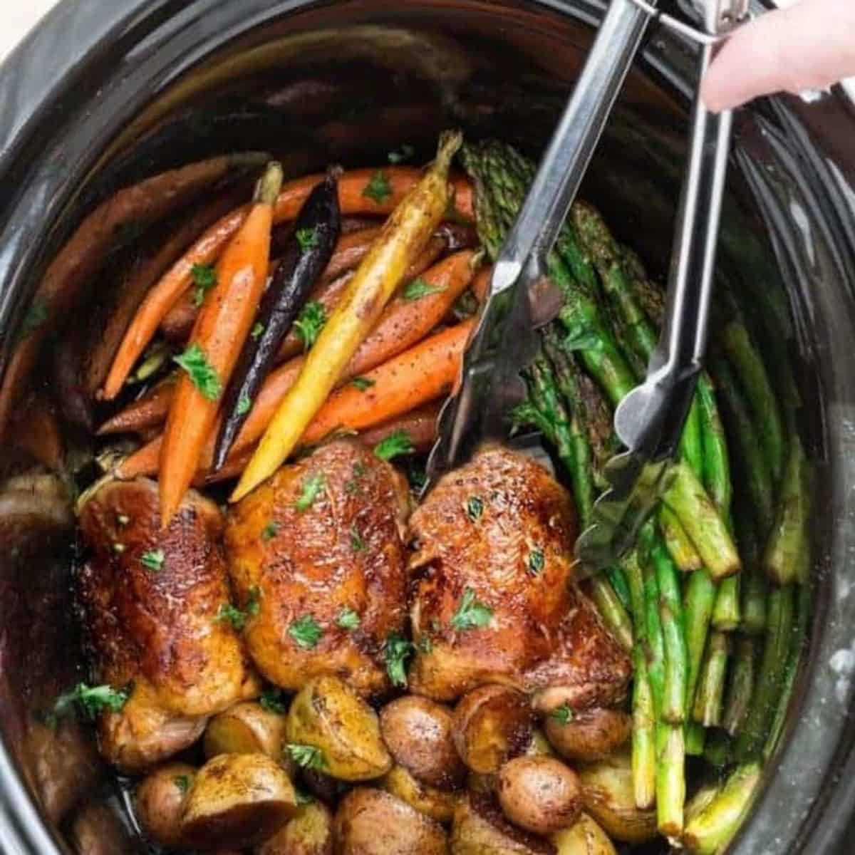 A yummy and delicious meal with a slow cooker harvest chicken and vegetables. 