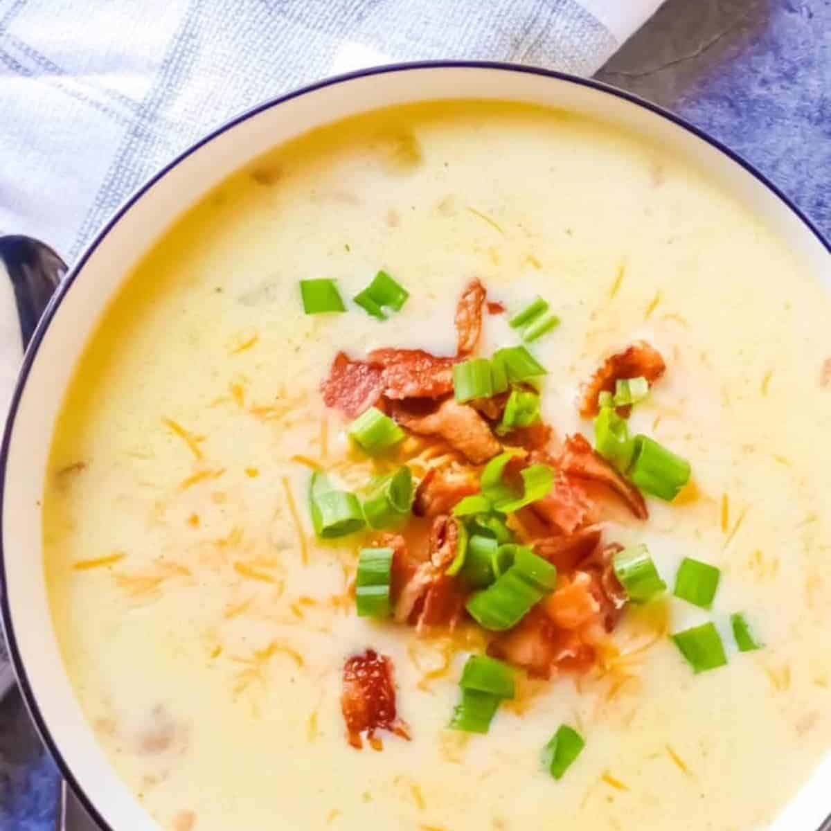 Delicious baked potato soup with fresh toppings.