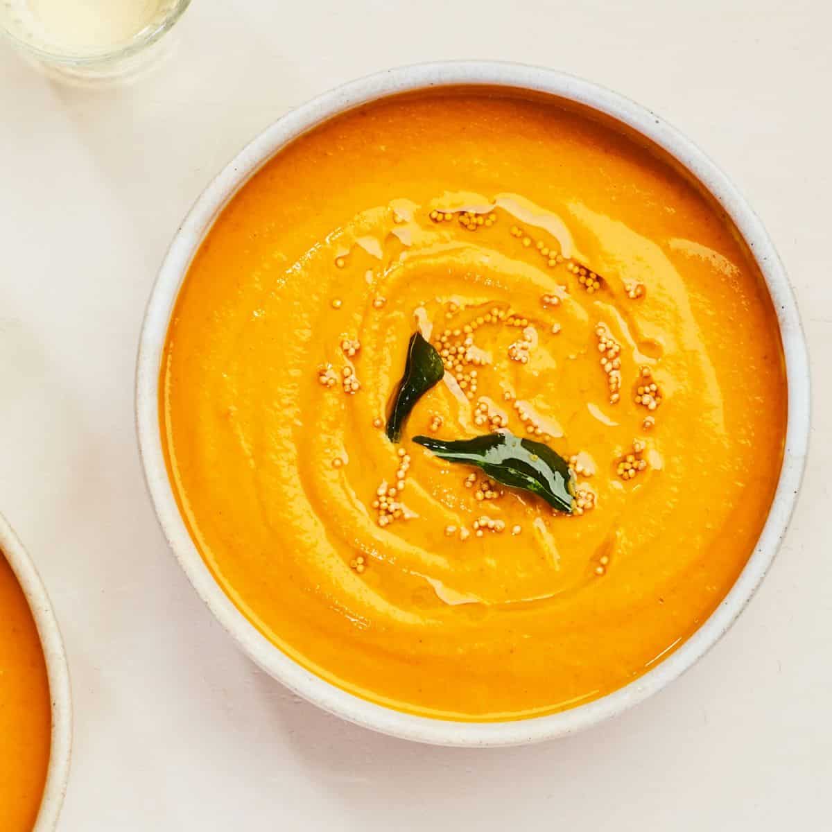 A warm and spicy curry pumpkin soup, perfect to be devoured this fall.