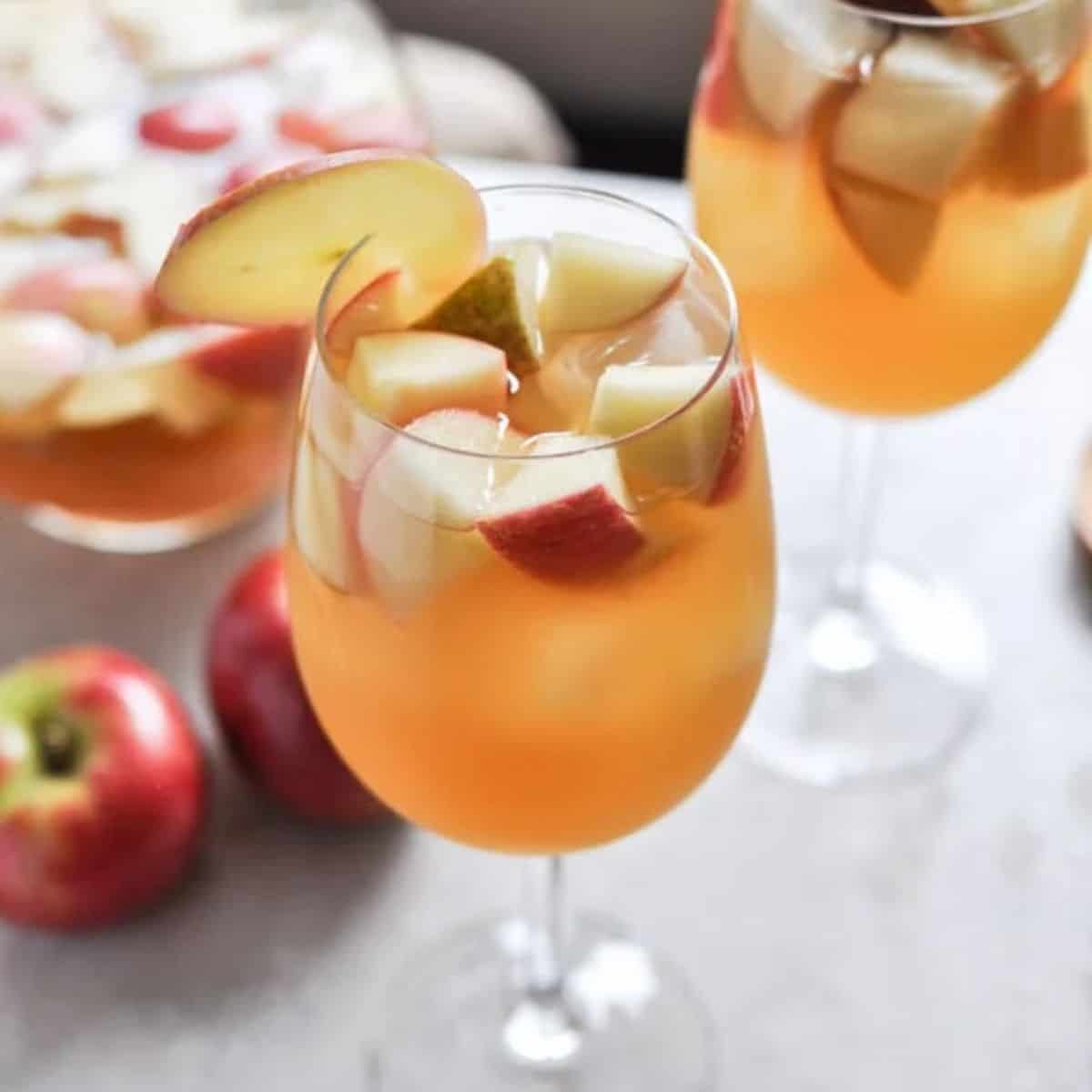 A refreshing fall drink featuring apple cider sangria.