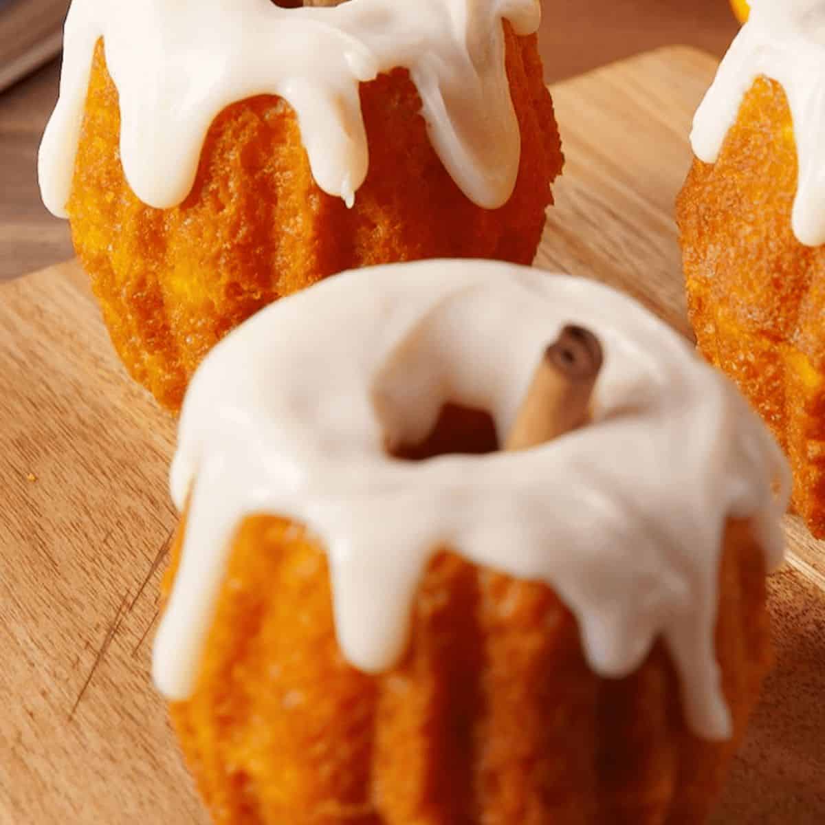 Chocolate filled pumpkins with a glazed topping making them look like pumpkins.