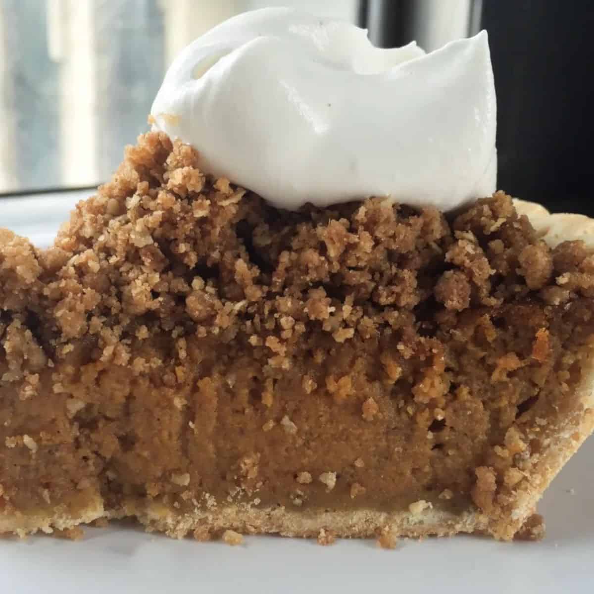 A delicious treat with Jack Daniels pumpkin pie with oat streusel and maple whiskey whipped cream.
