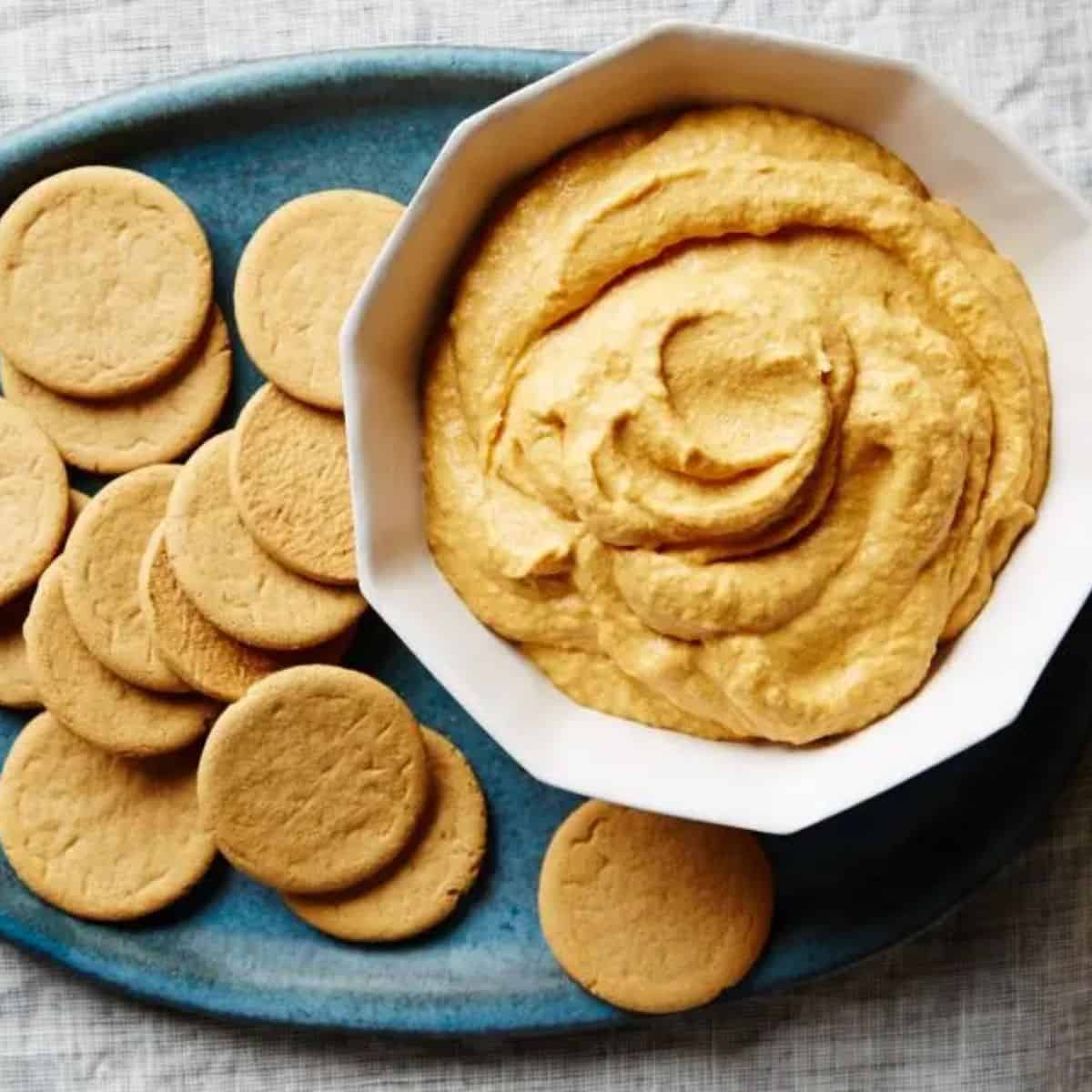 A yummy treat with a pumpkin dip.