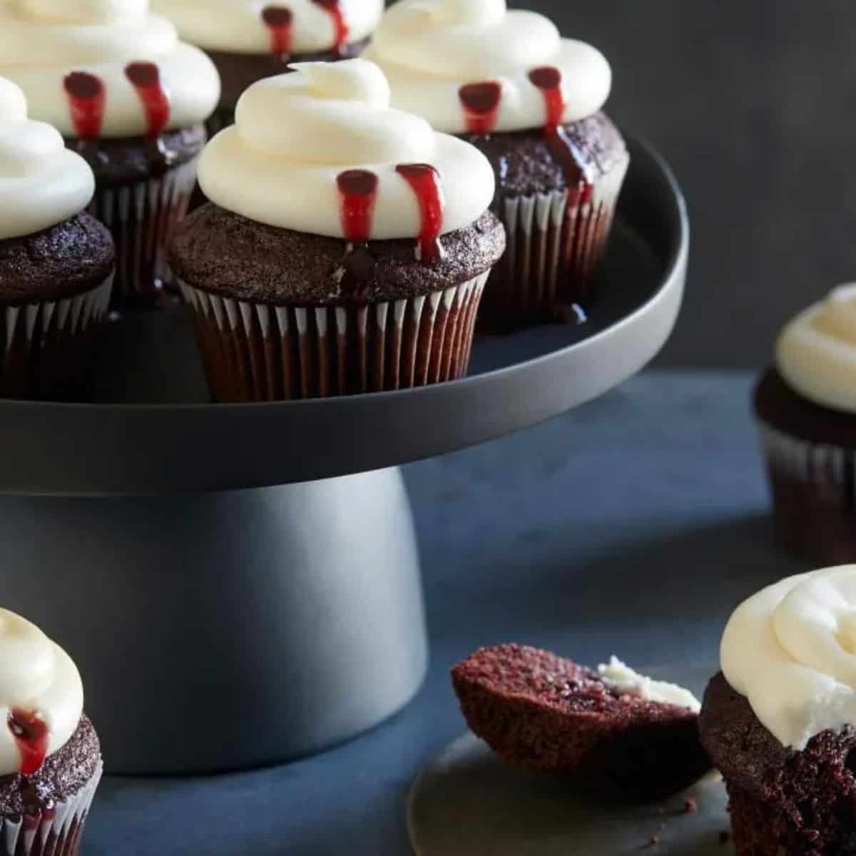 A spooky delight with Halloween red velvet vampire cupcakes.