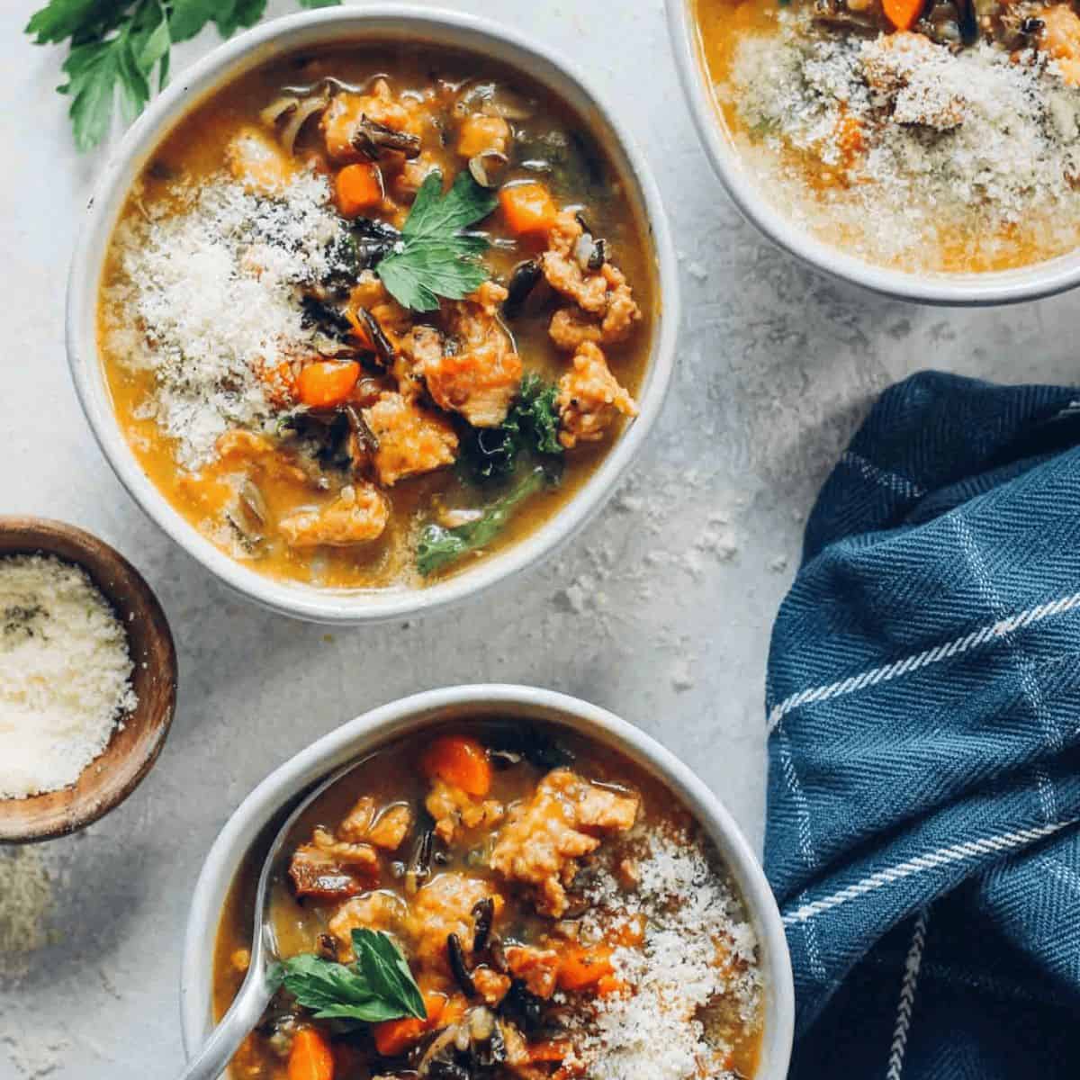 A comforting delight with butternut squah, sausage and wild rice soup.