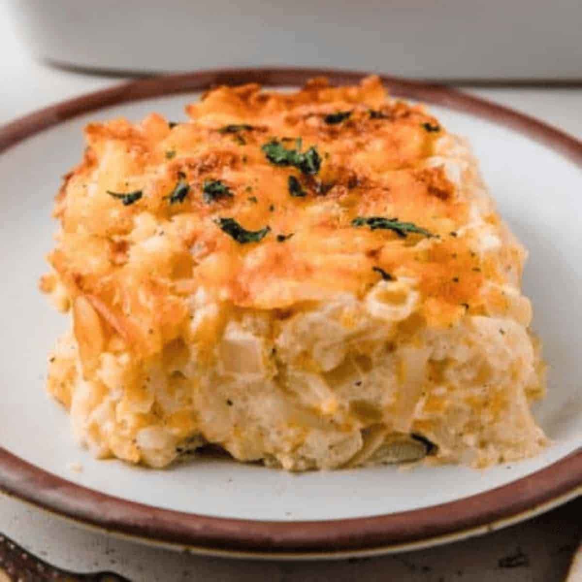 Hashbrown potatoes with gooey cheddar cheese, tangy sour cream, and a rich homemade cream of chicken soup featuring sourdough starter.