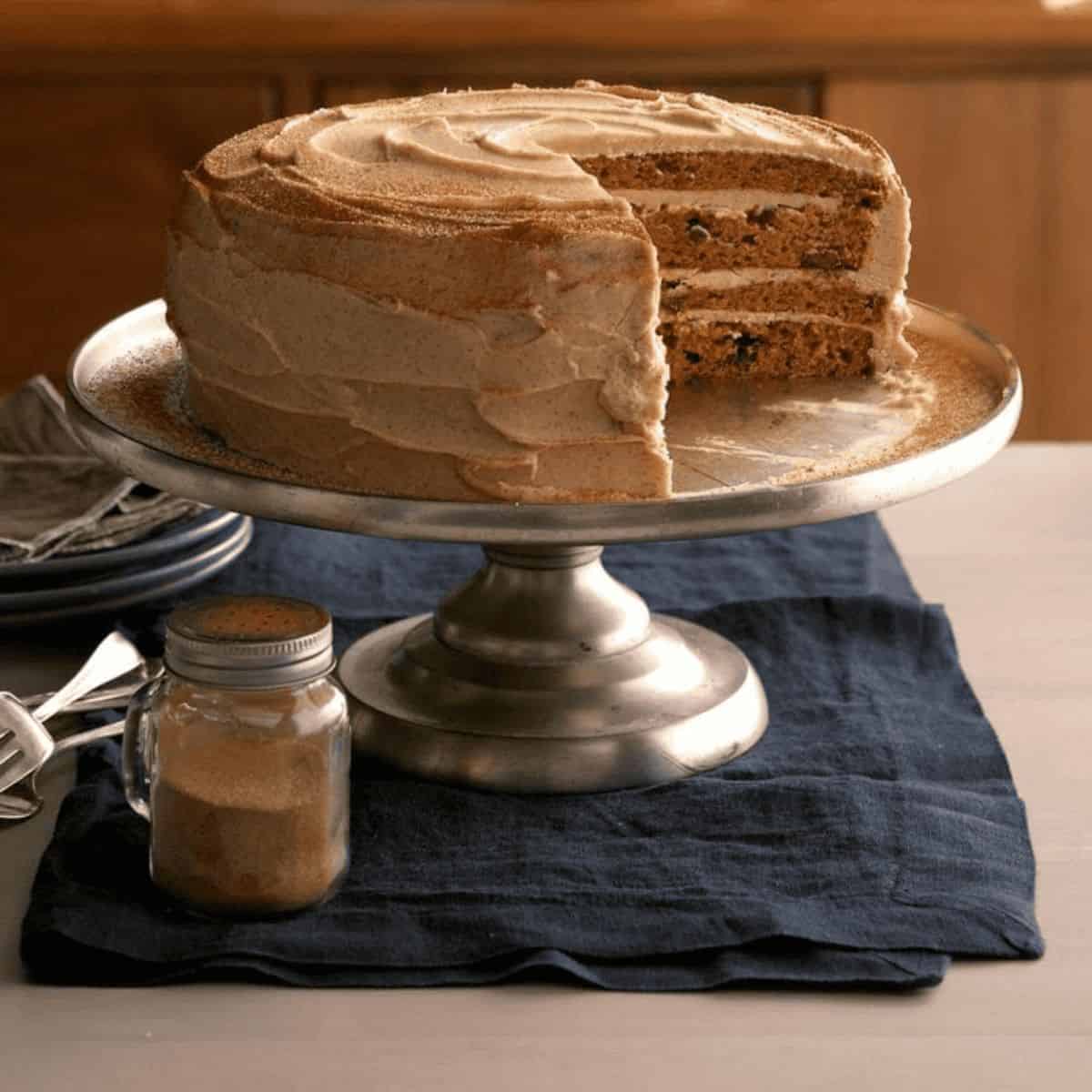 A yummy delight with pumpkin cake with whipped cinnamon frosting.