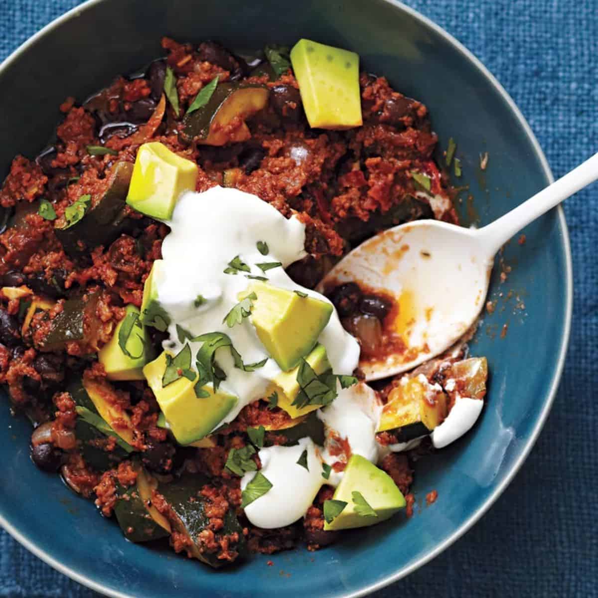 A cozy treat with slow cooker black beans and zucchini chili. 