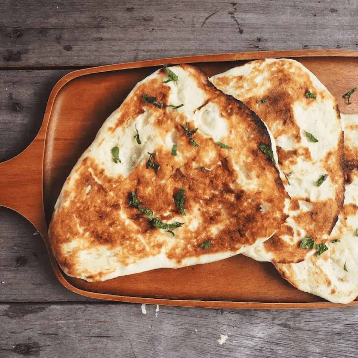 The perfect comfort food featuring a sourdough naan. 