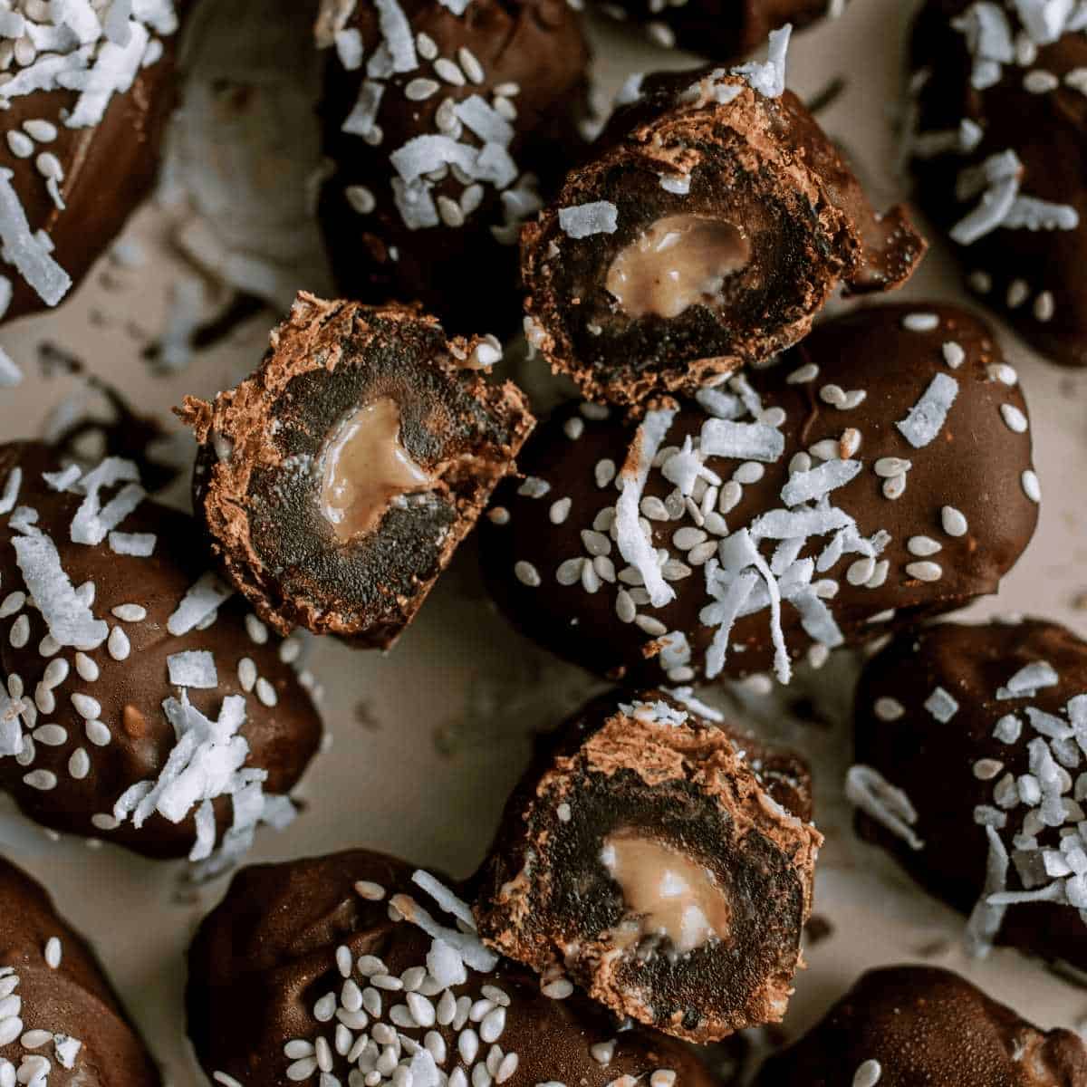 The best date dessert featuring tahini stuffed chocolate covered dates.