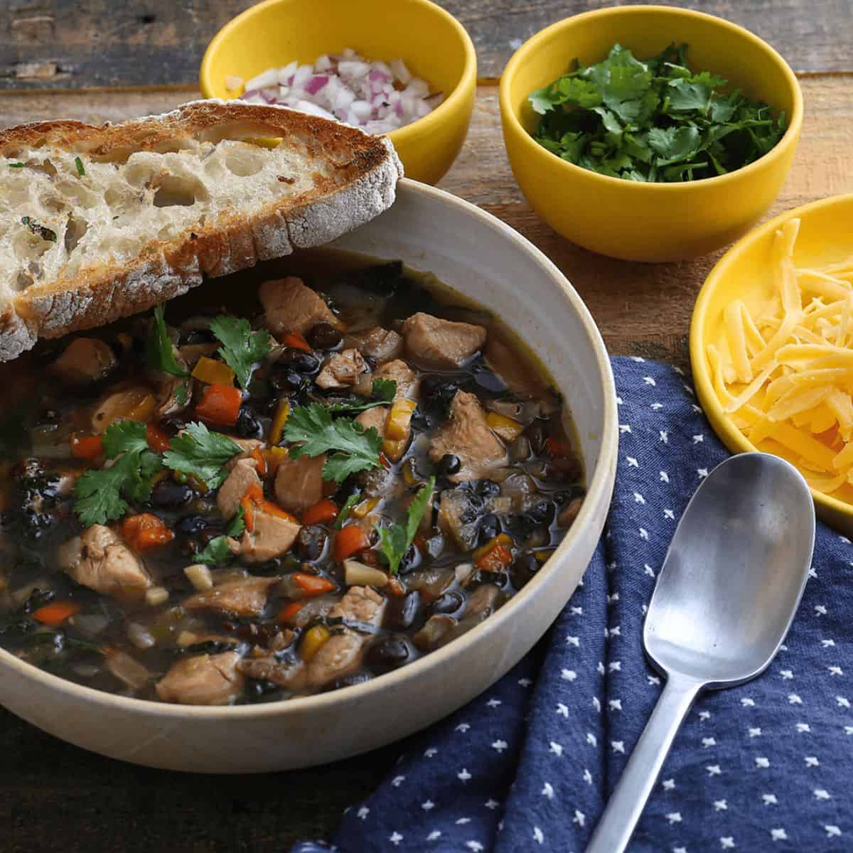 A yummy treat with white chicken chili with black beans.