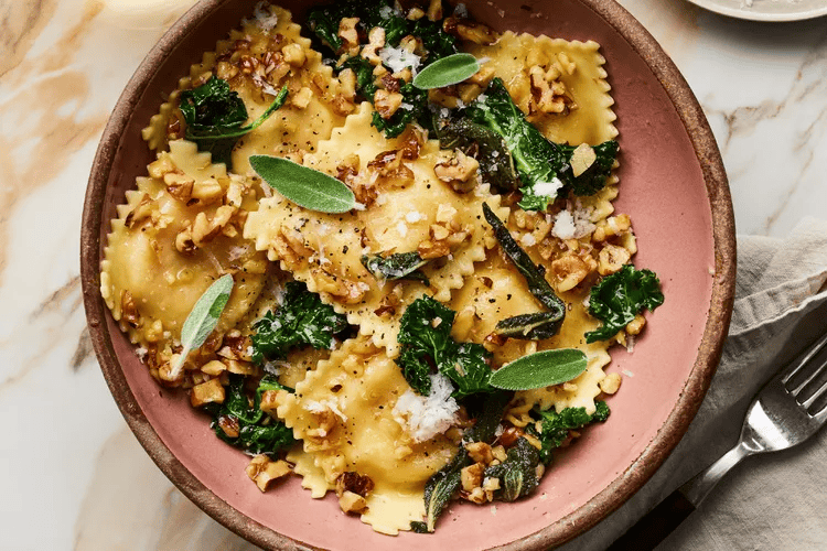 A delicious butternut squash recipe featuring butternut squash ravioli with brown butter and sage.