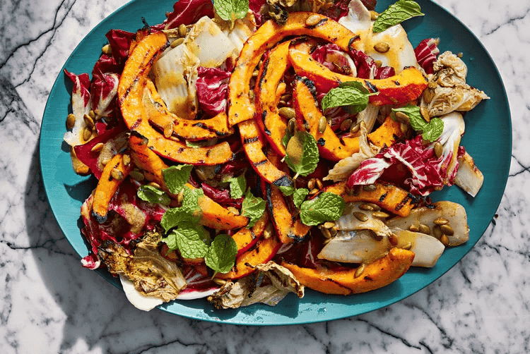 A delicious butternut squash recipe featuring grilled honeynut squash salad.
