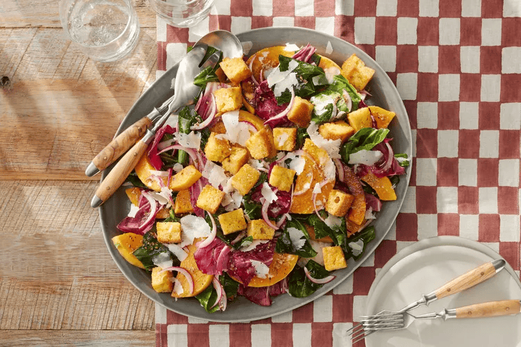 A scrumptious meal with butternut squash salad.