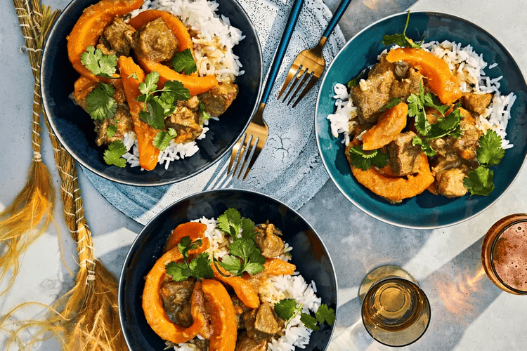 A scrumptious meal with pork and kabocha squash curry.