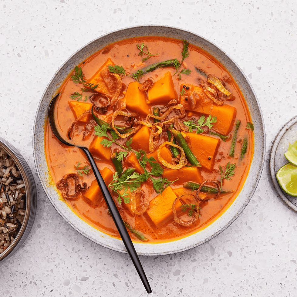 A delicious butternut squash recipe featuring butternut squash with green bean stew.