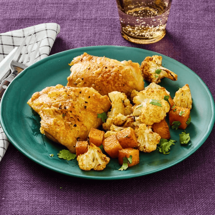 A scrumptious meal with butternut squash, sheet pan chicken and cauliflower.