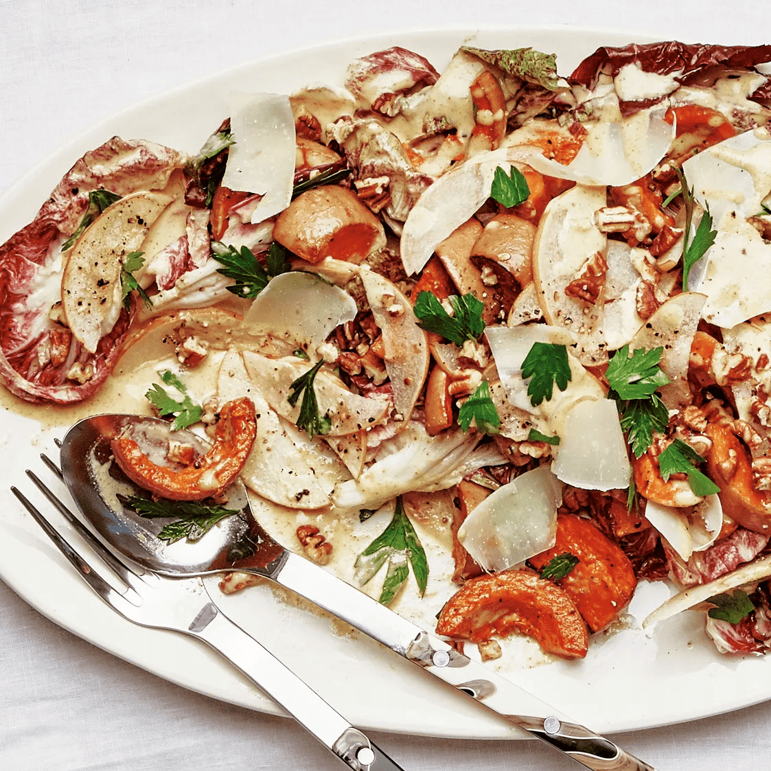 A delicious butternut squash recipe featuring squash and radicchio salad and pecans.