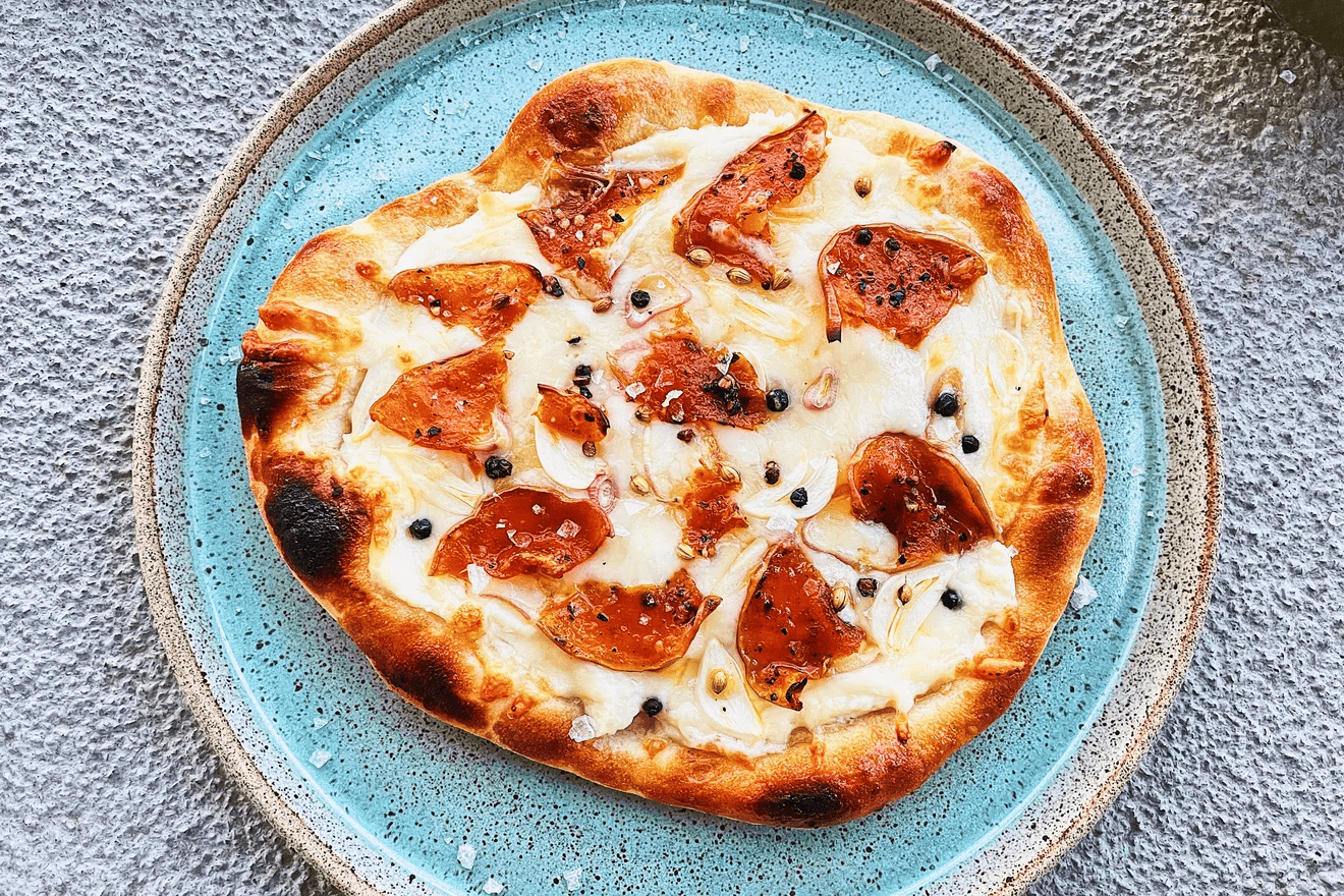 A yummy treat with caramelized butternut squash pizza.