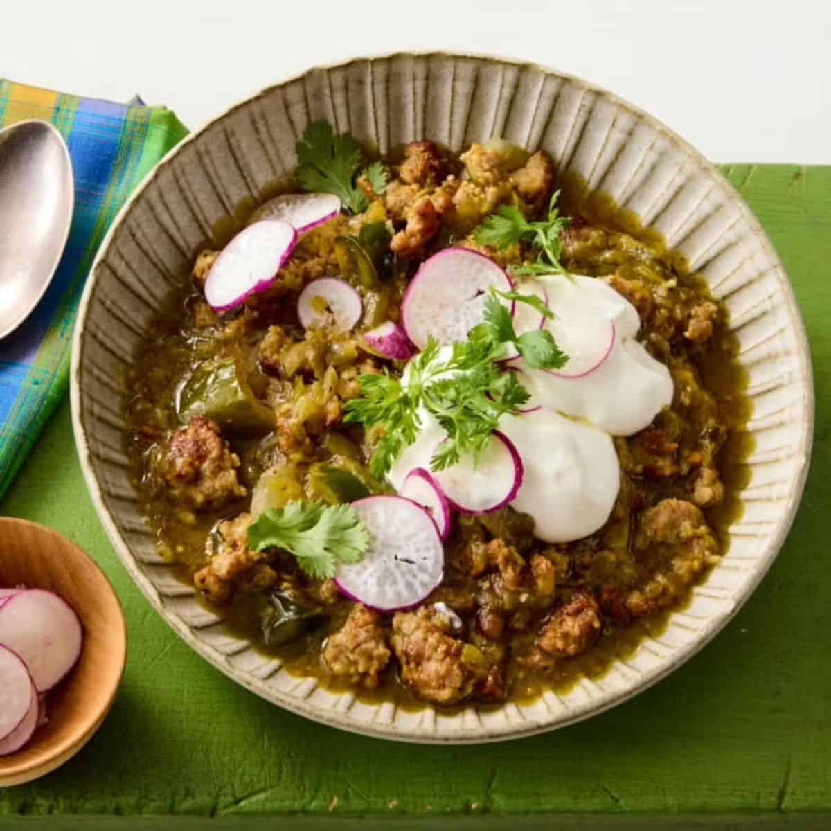 A flavorful bowl of Chili Verde, made with tender pork or chicken, green chilies, tomatillos, and spices for a tangy, savory dish.
