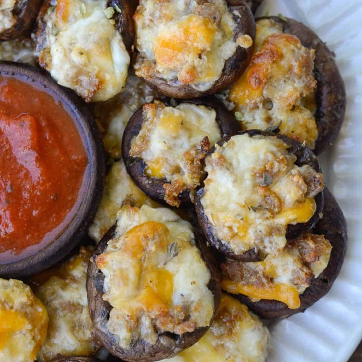 A flavorful meal with Italian sausage stuffed mushrooms served with a  yummy tomato sauce. 