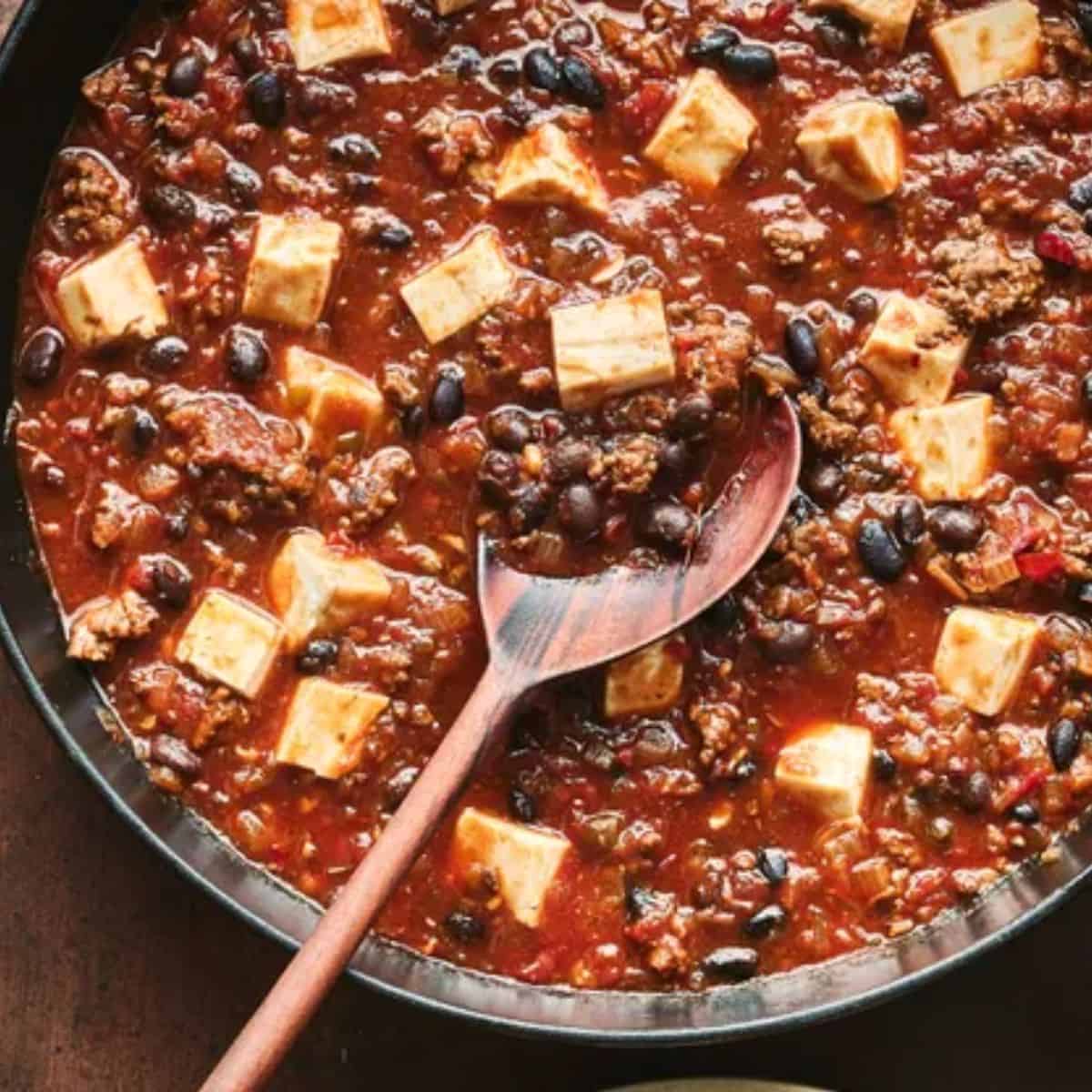 A bold bowl of Mapo Tofu-Inspired Beef and Black Bean Chili, featuring ground beef, black beans, and spicy, savory flavors inspired by traditional Mapo Tofu.
