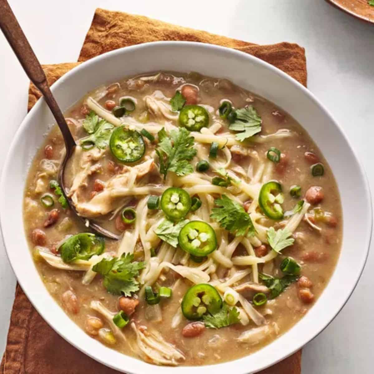 A comforting bowl of Rotisserie Chicken Chili, made with shredded rotisserie chicken, beans, tomatoes, and a blend of spices.
