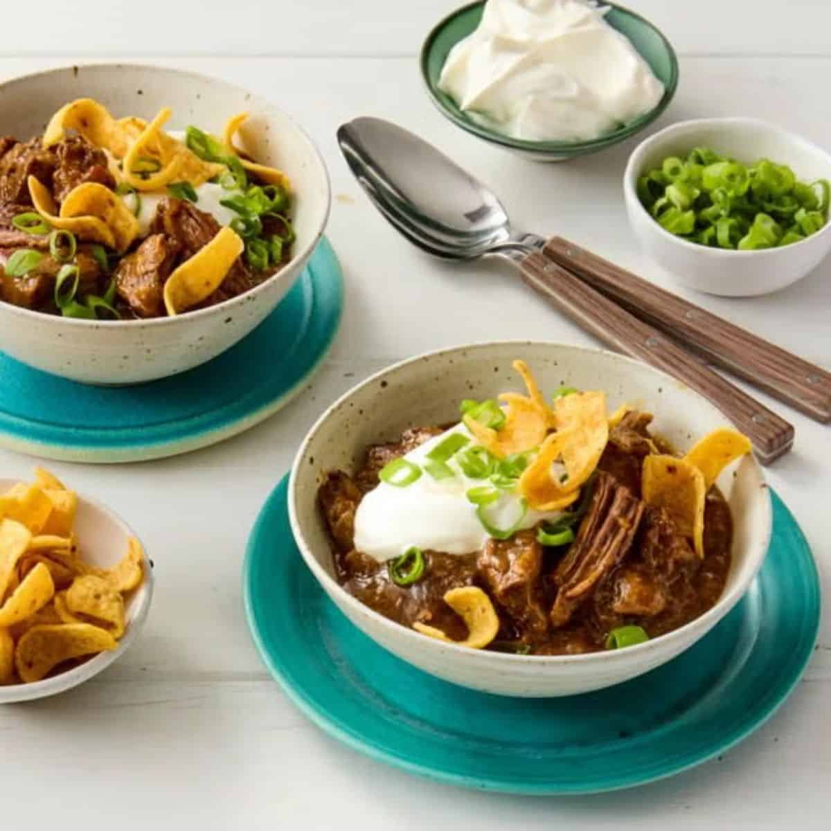 A savory bowl of Slow Cooker Chipotle Beef Chili, made with tender beef, chipotle peppers, beans, and spices, slow-cooked to perfection for rich flavor.







