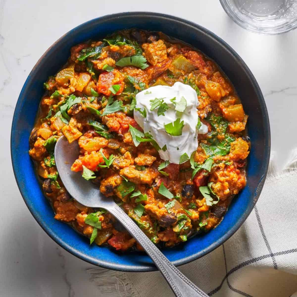 A comforting bowl of Turkey Pumpkin Chili, made with lean turkey, pumpkin, beans, and a blend of savory spices for a seasonal, hearty meal.
