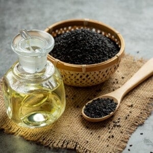 sesame oil and raw black sesame seeds