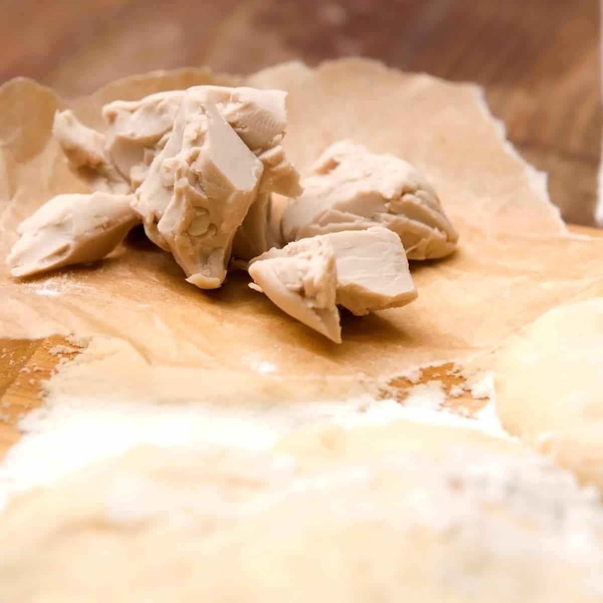 bakers yeast on wooden board