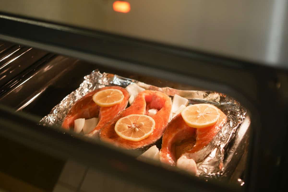 salmon fillets in an oven