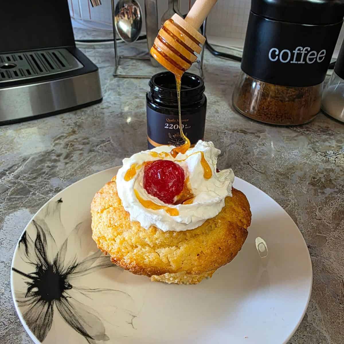 biscuits with cream, jam and honey