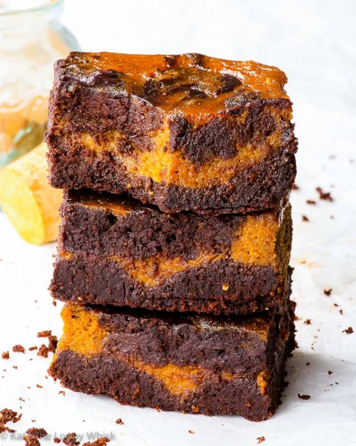 A stack of swirled pumpkin brownies served as healthy fall desserts